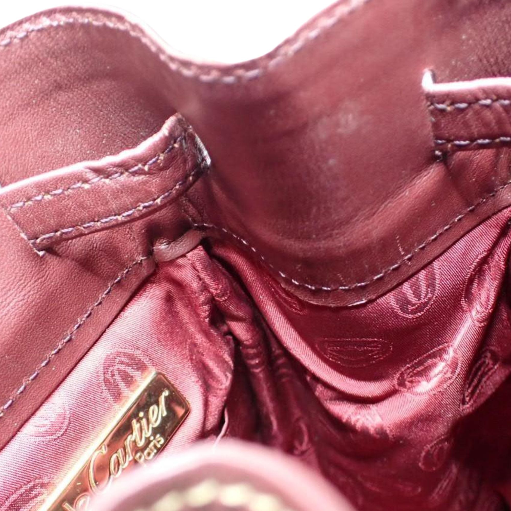 Bolso Bucket Cartier Must de Cartier Burdeos en Piel con Herrajes Dorados