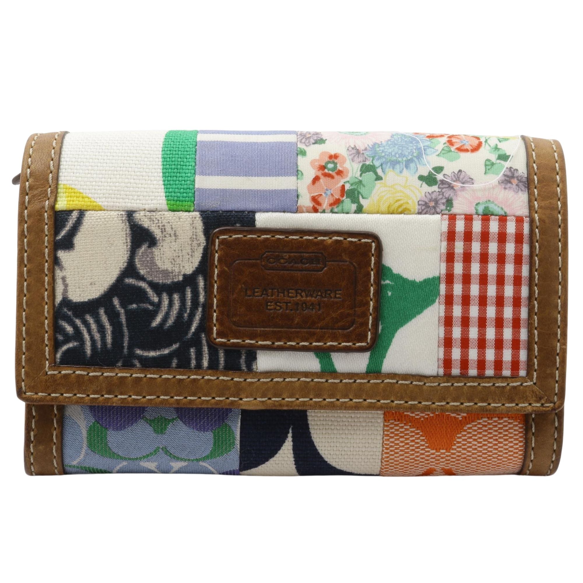 Cartera Coach patchwork multicolor con detalles en cuero y llavero interior