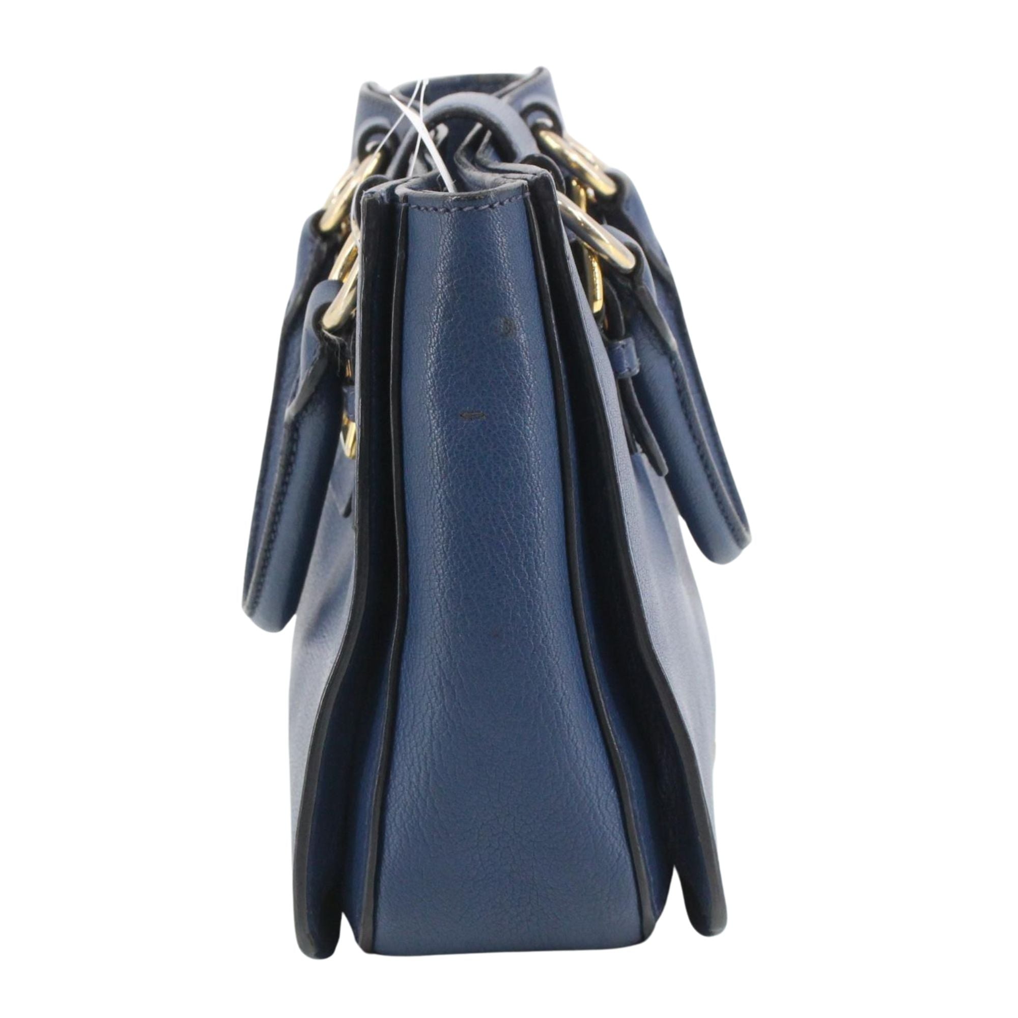 Bolso Miu Miu de piel azul con herrajes dorados