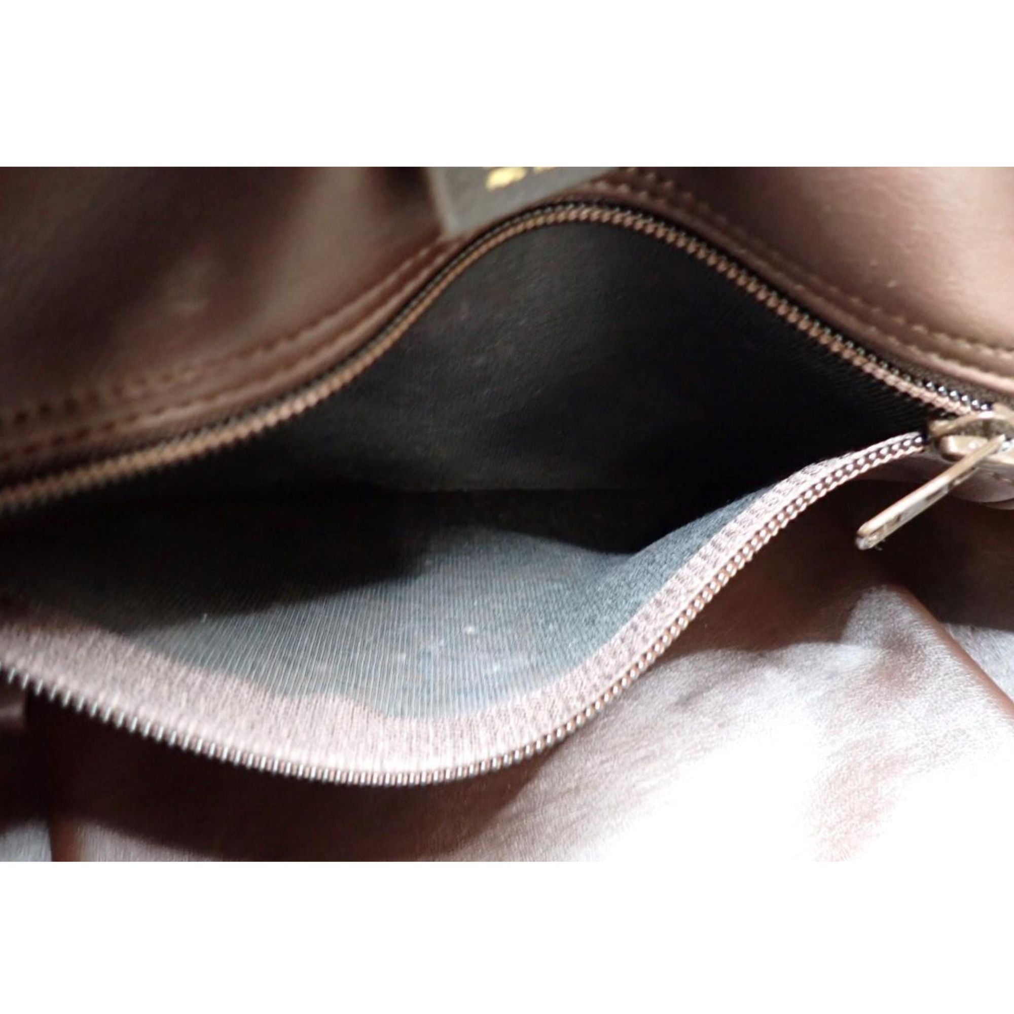 Longchamp Vintage Travel Bag en cuero marrón con estampado ecuestre