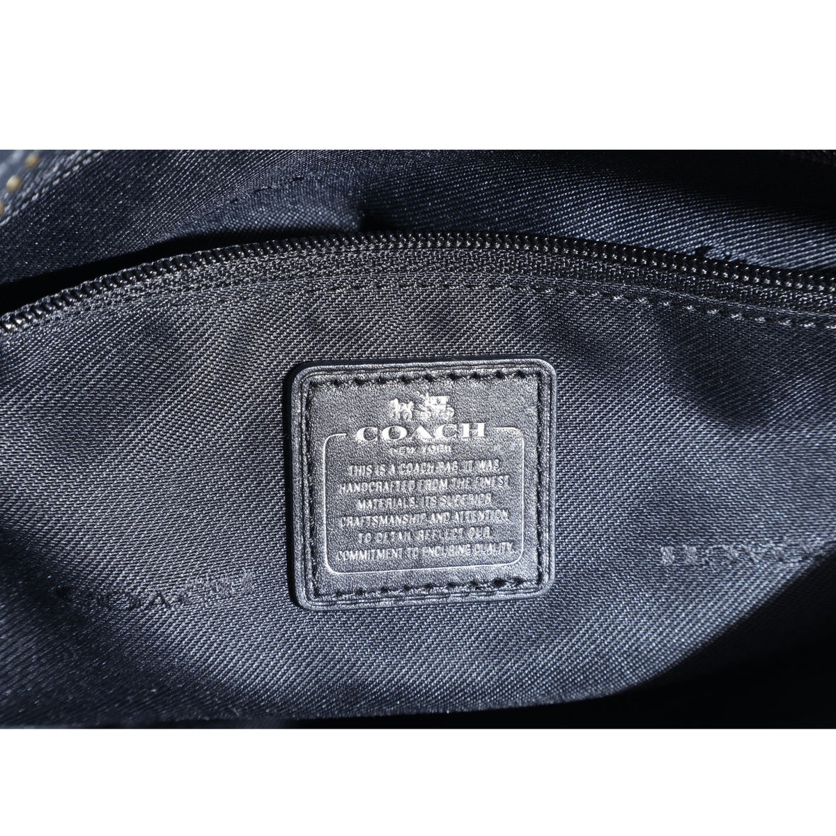 Coach Swagger 27 – Bolso de piel negra con herrajes plateados