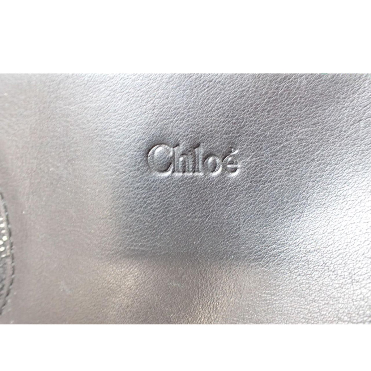 Chloé – Bolso de hombro negro de piel con flores y detalles dorados