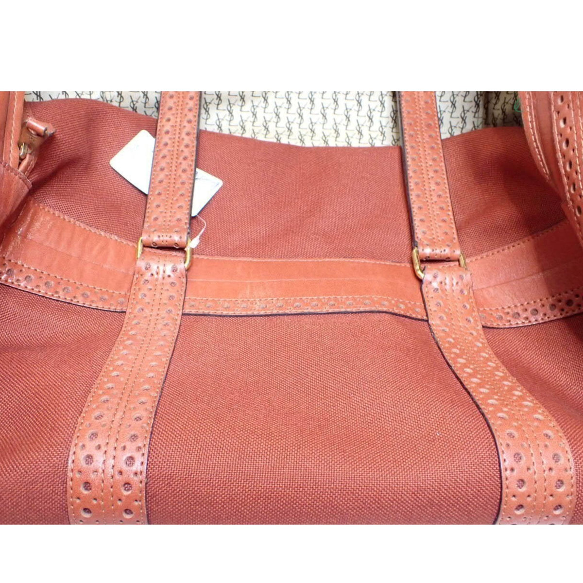 Yves Saint Laurent Bagages – Bolso de viaje vintage marrón coñac con piel perforada y cinco bolsillos