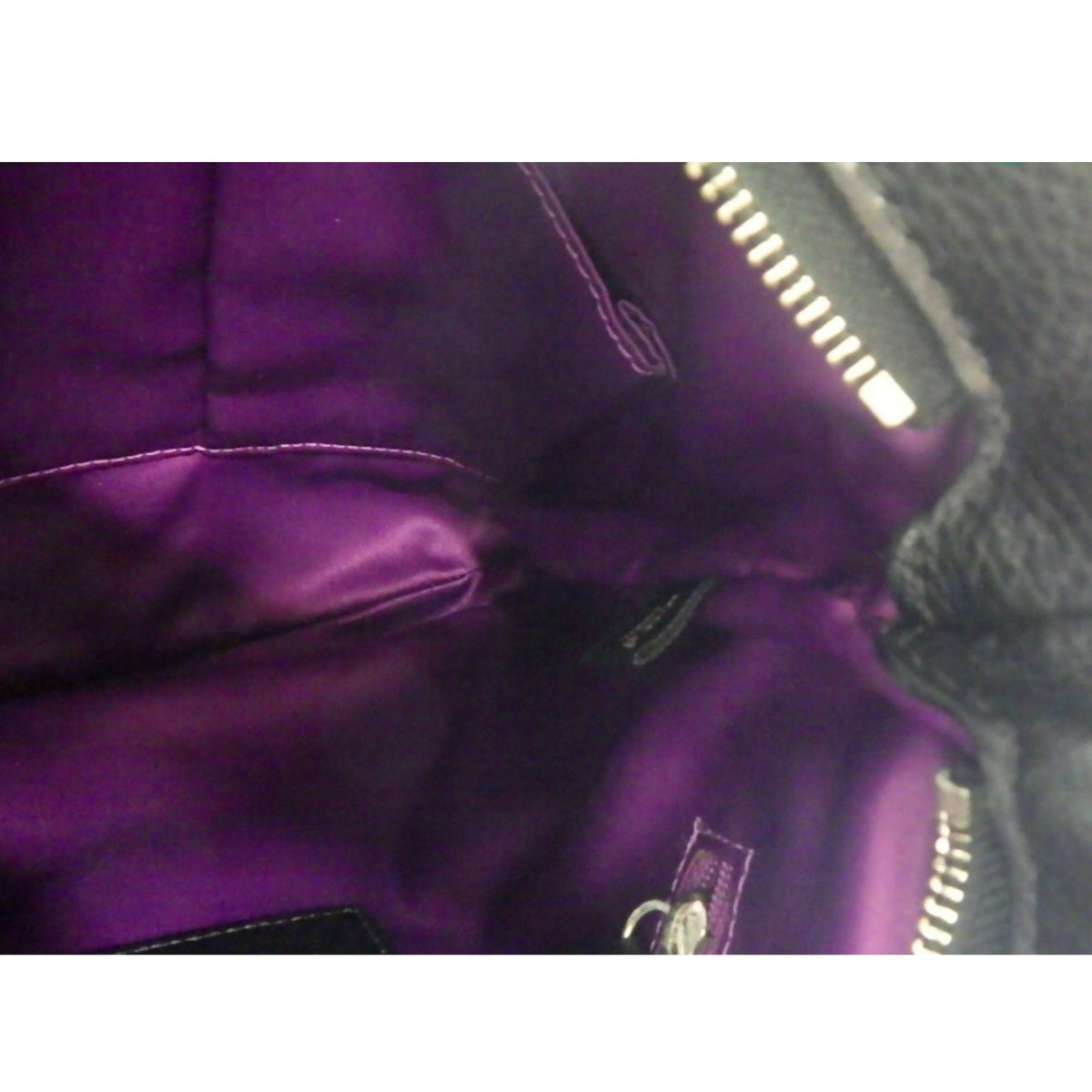 Coach – Bolso bandolera de piel negra con doble hebilla plateada