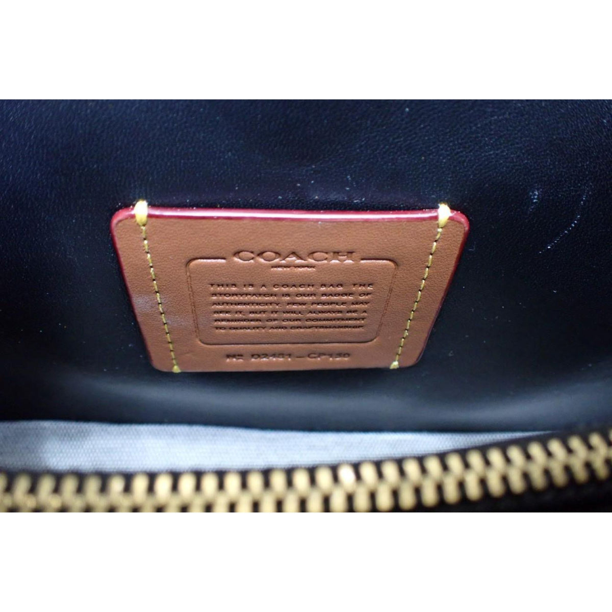 Coach Tabby acolchado negro de piel con cadena dorada