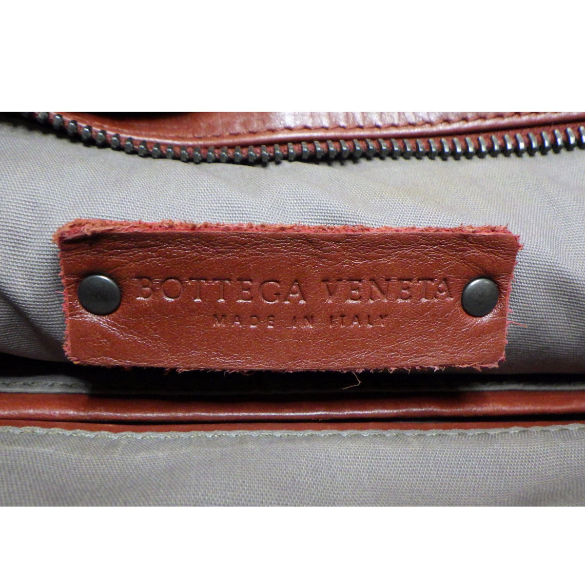 Bottega Veneta Intrecciato – Bolso bandolera de piel trenzada color coñac