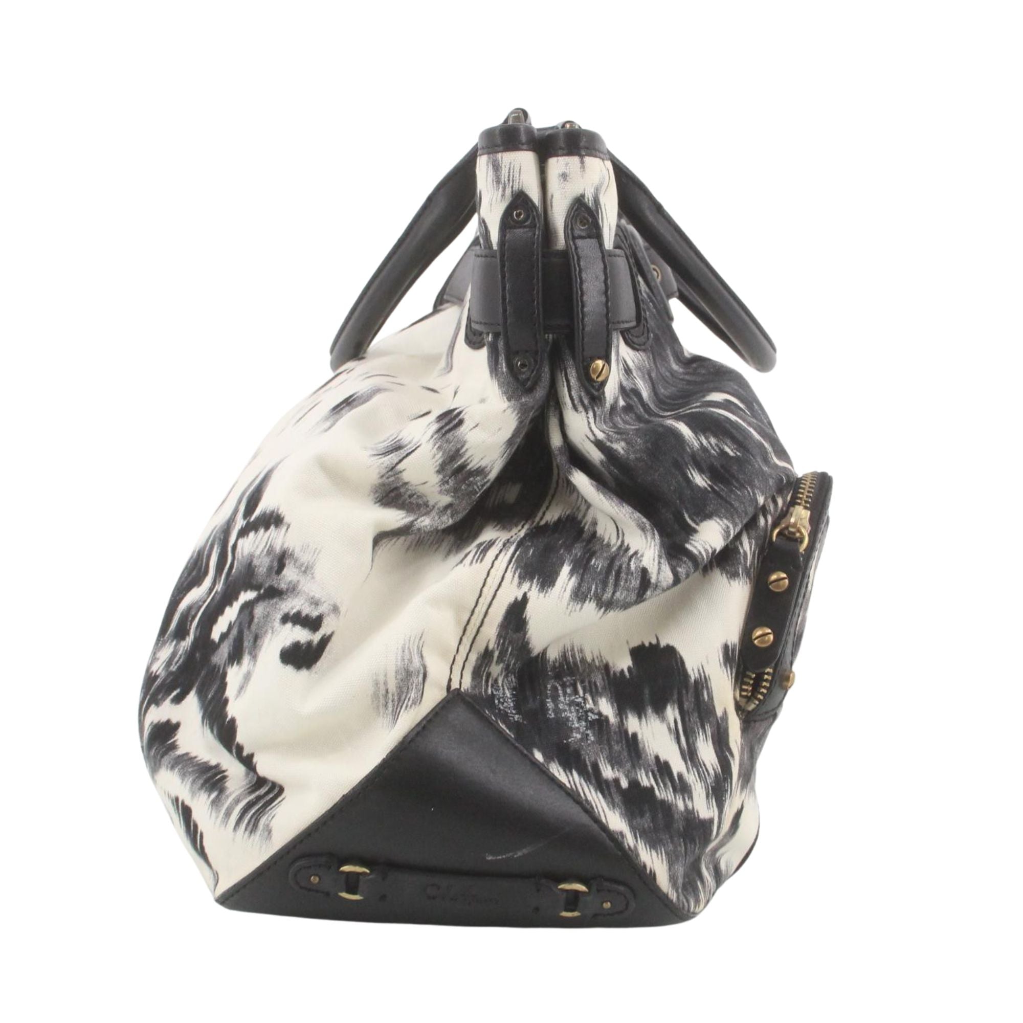 Bolso Cole Haan estampado animal print en blanco y negro – Diseño urbano y gran capacidad