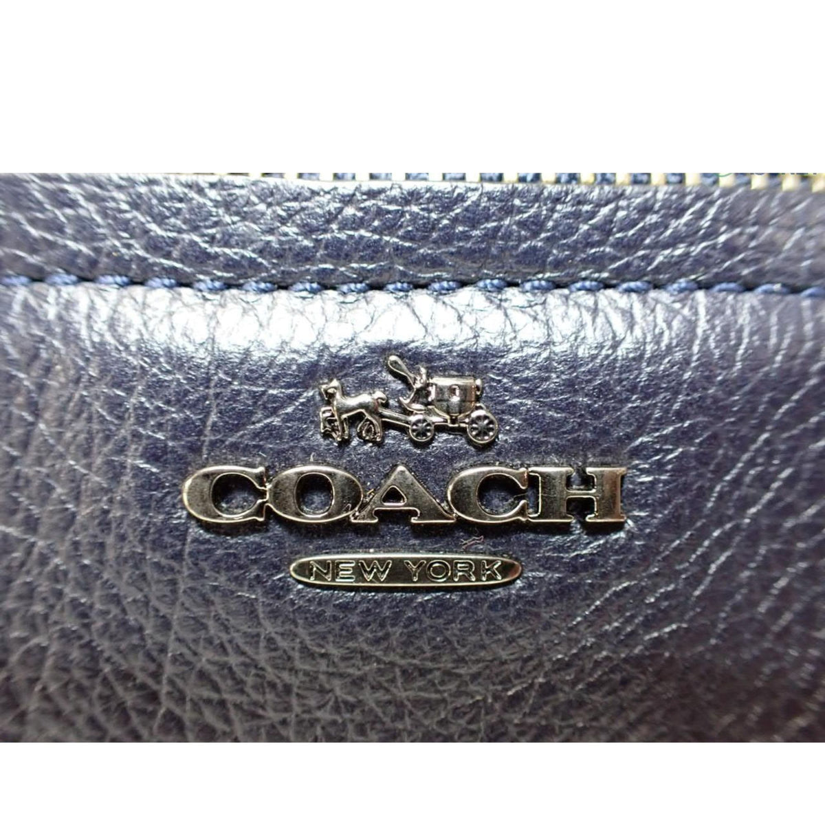 Coach New York – Bolso bandolera de piel azul marino con cadena