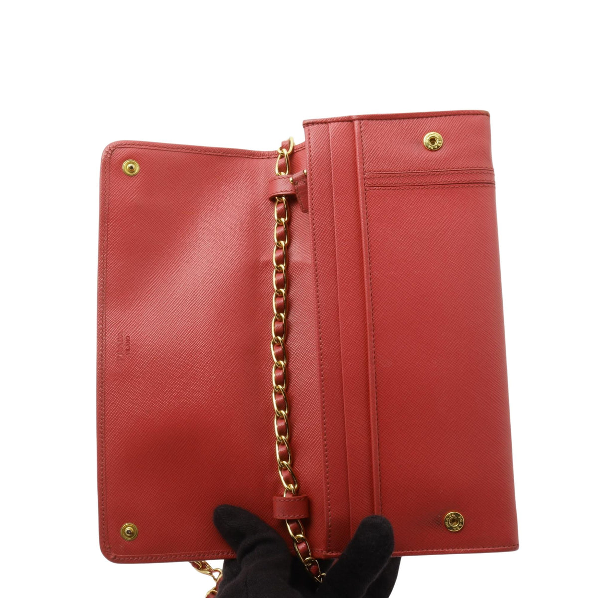 Prada Saffiano – Bolso cartera de piel roja con cadena dorada y lazo