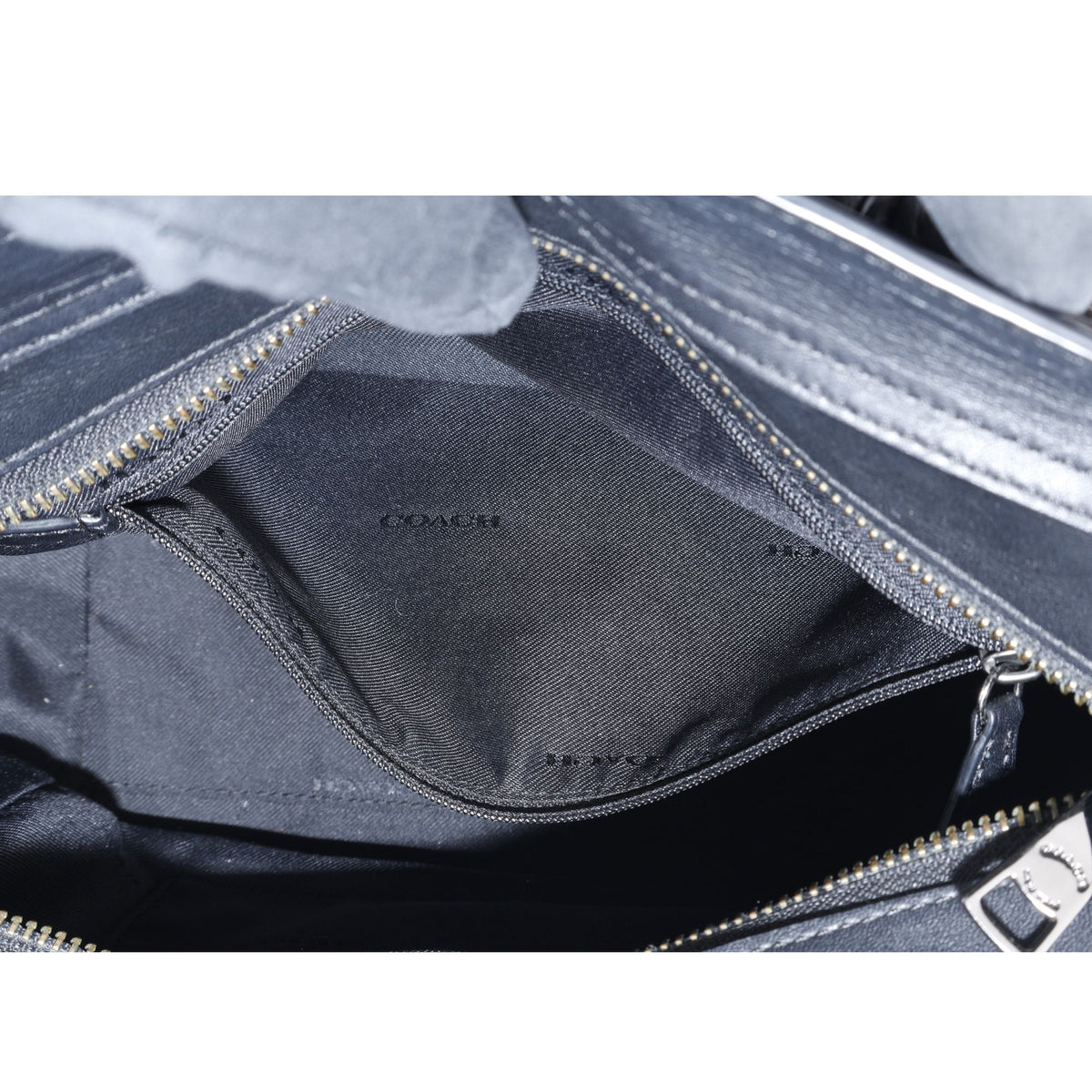 Coach Swagger 27 – Bolso de piel negra con herrajes plateados