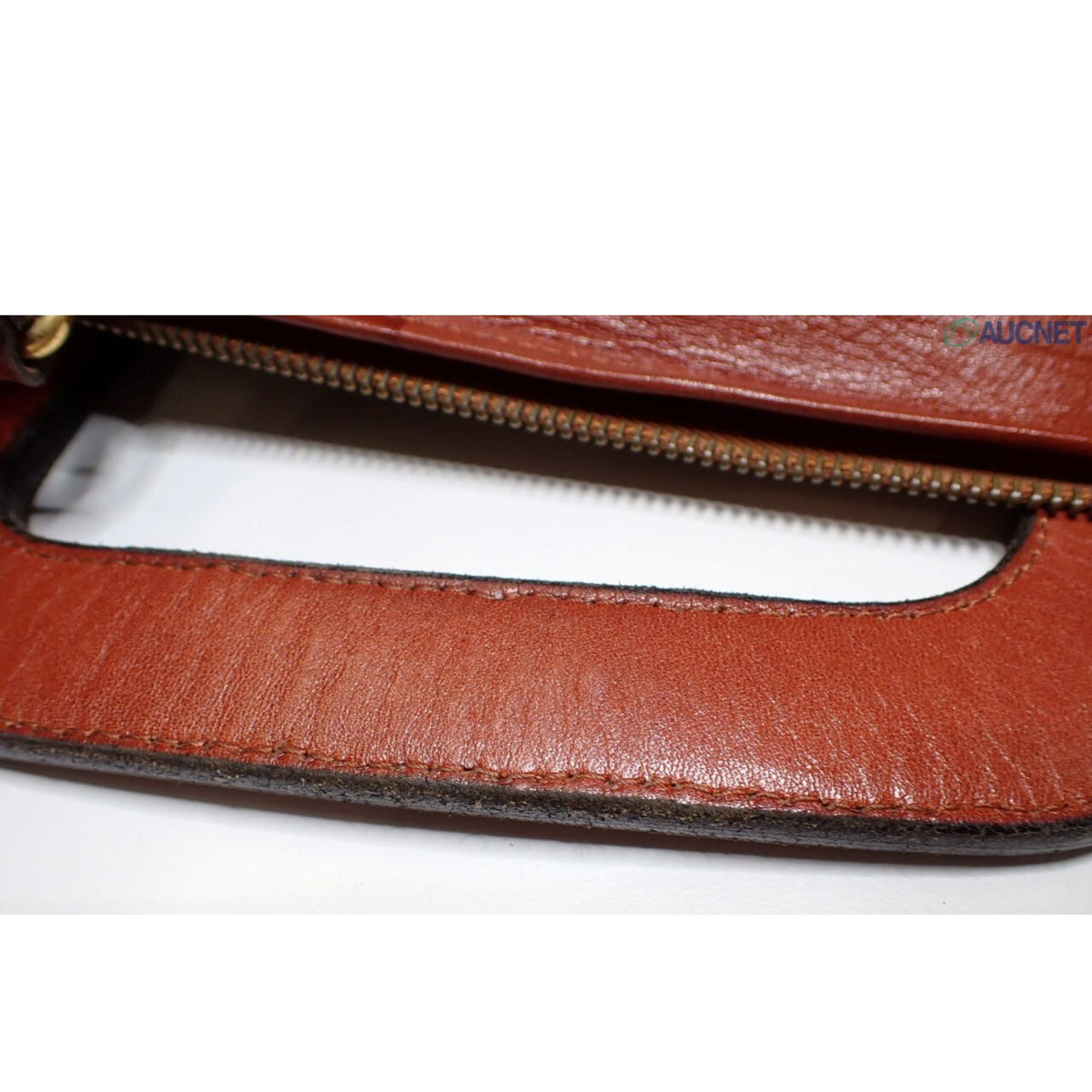 Yves Saint Laurent Bagages – Bolso de viaje vintage marrón coñac con piel perforada y cinco bolsillos