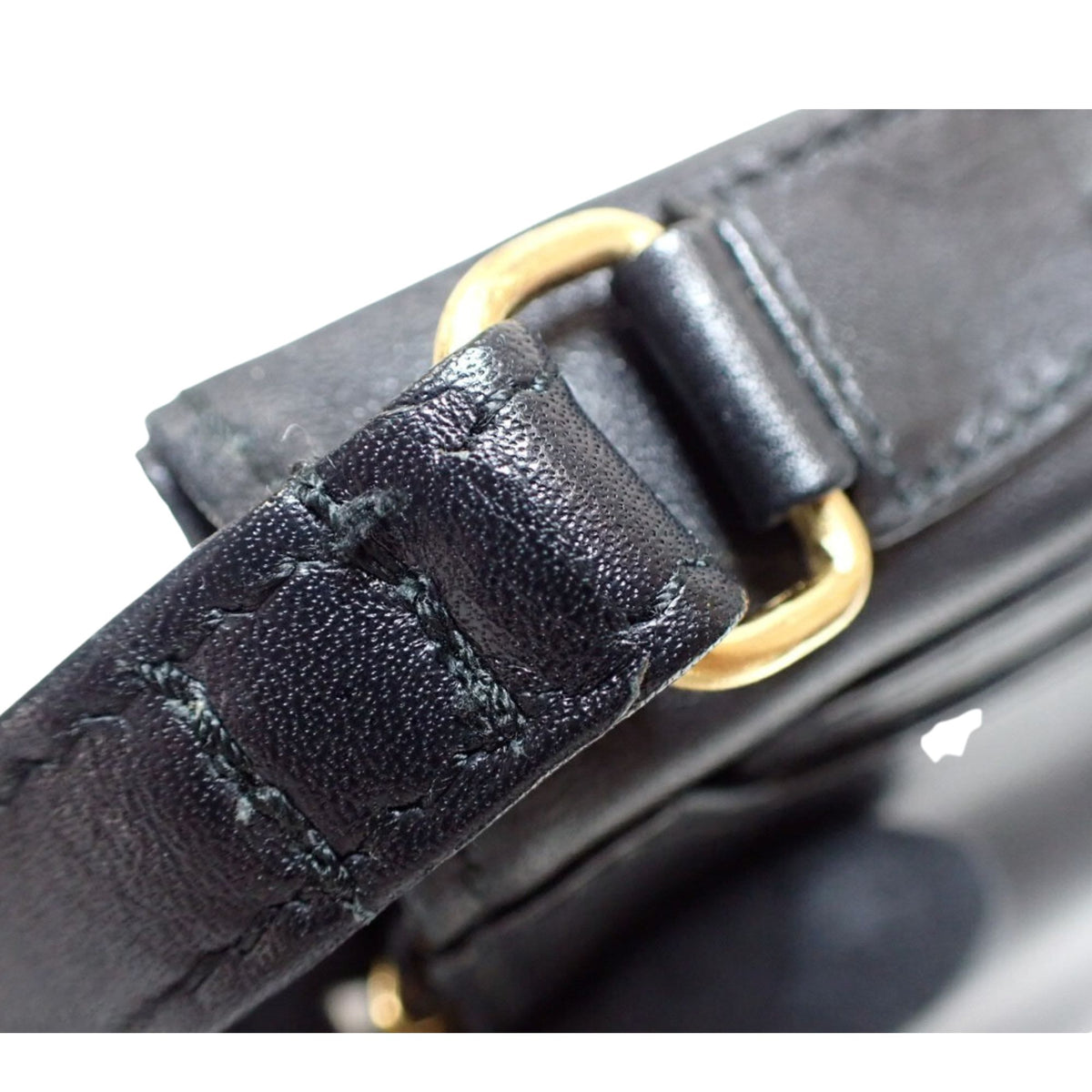 Loewe Anagram Vintage – Clutch de mano en piel negra con detalles dorados