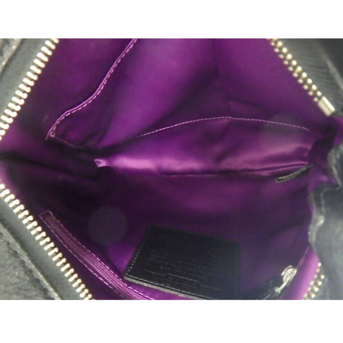 Coach – Bolso bandolera de piel negra con doble hebilla plateada