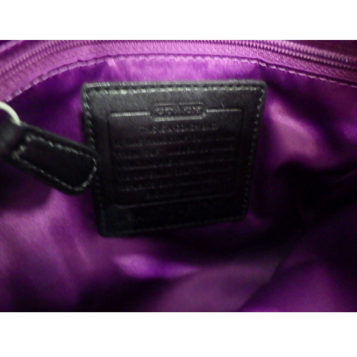 Coach – Bolso bandolera de piel negra con doble hebilla plateada