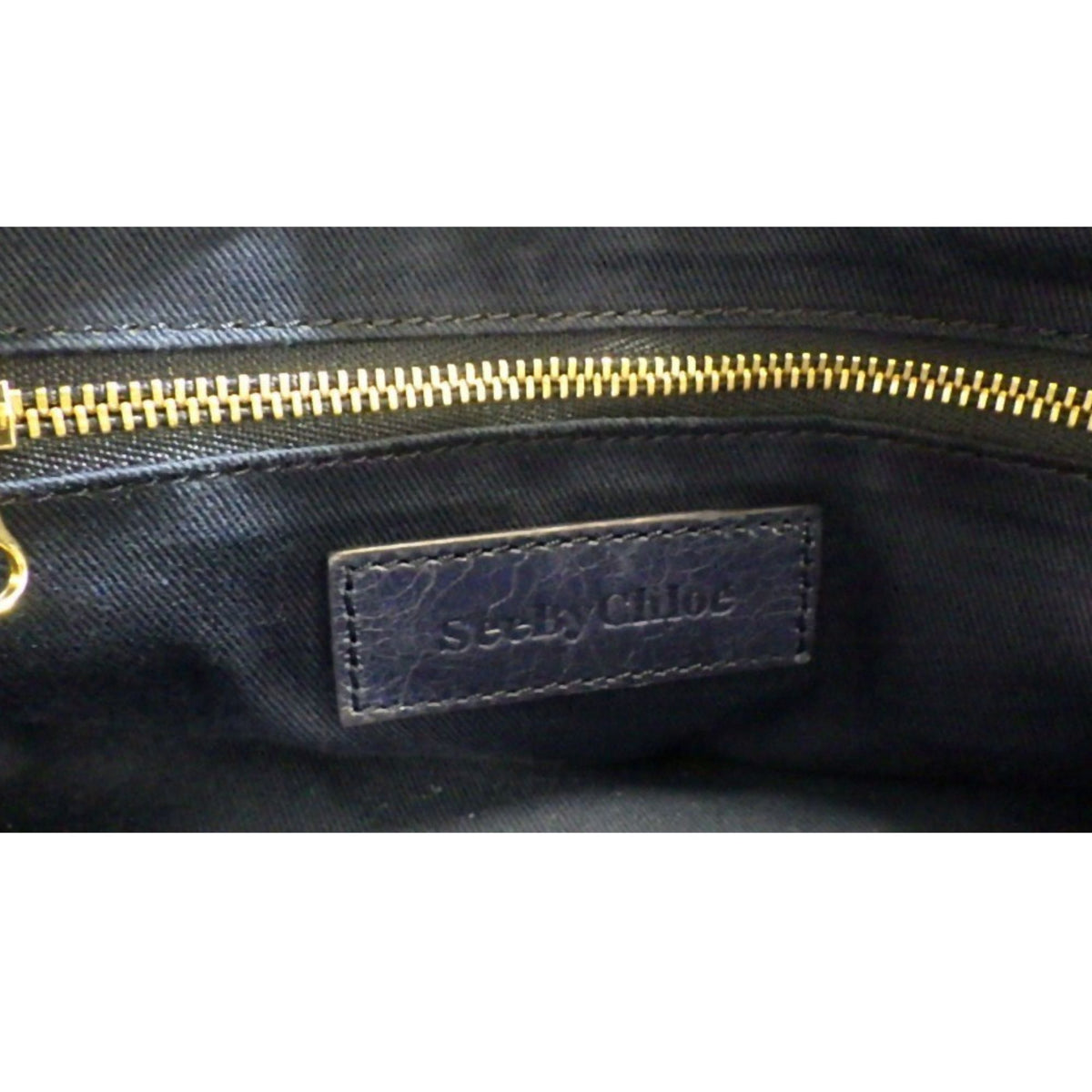 See by Chloé Paige – Bolso de piel azul marino con herrajes dorados y bandolera