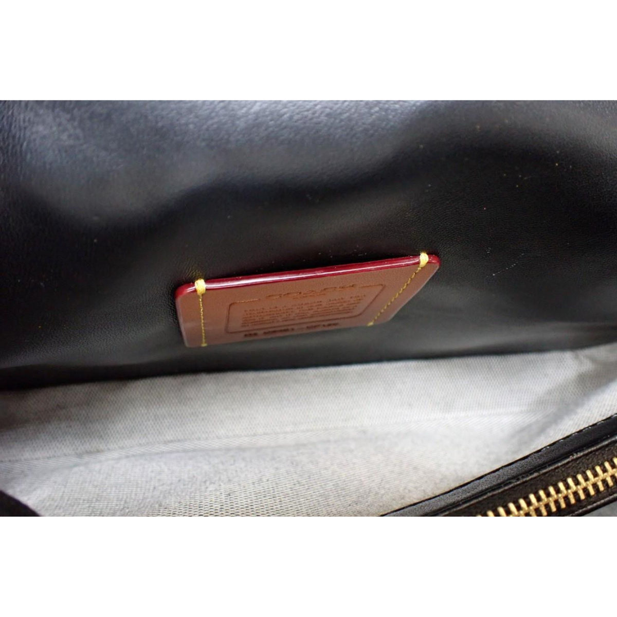 Coach Tabby acolchado negro de piel con cadena dorada