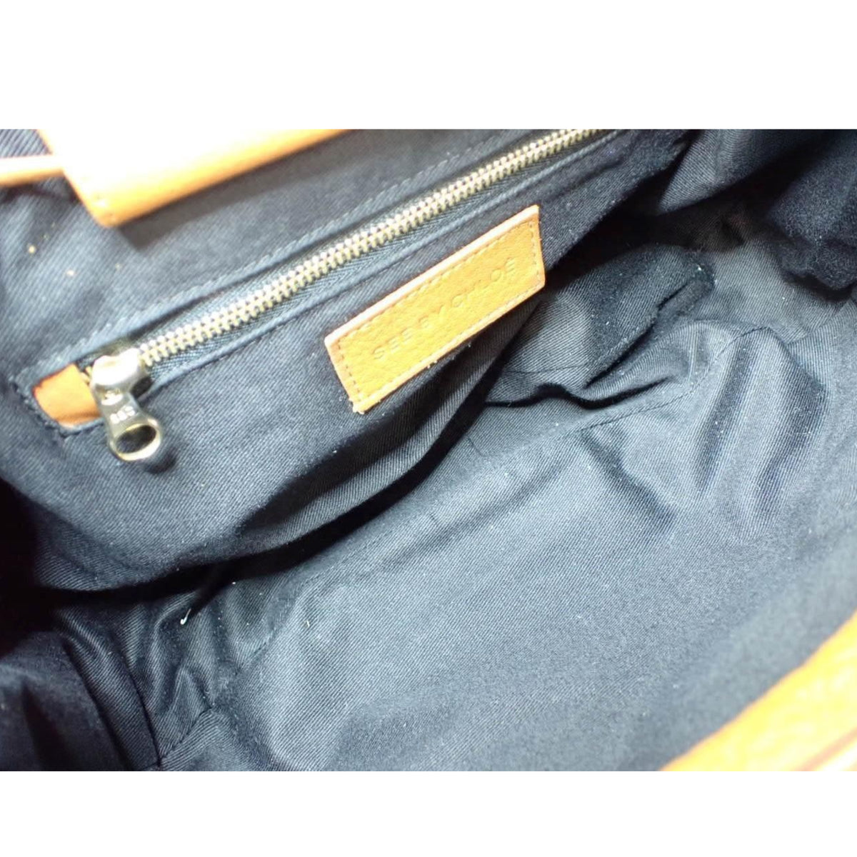 See by Chloé Cherry – Bolso vintage de piel marrón coñac con borla y cremalleras doradas