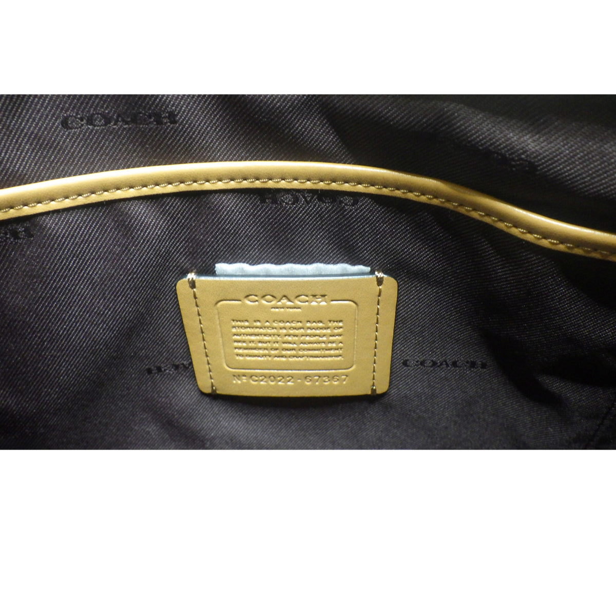 Coach Bolso de Hombro y Bandolera Negro y Beige con Estampado Geométrico y Detalles de Piel